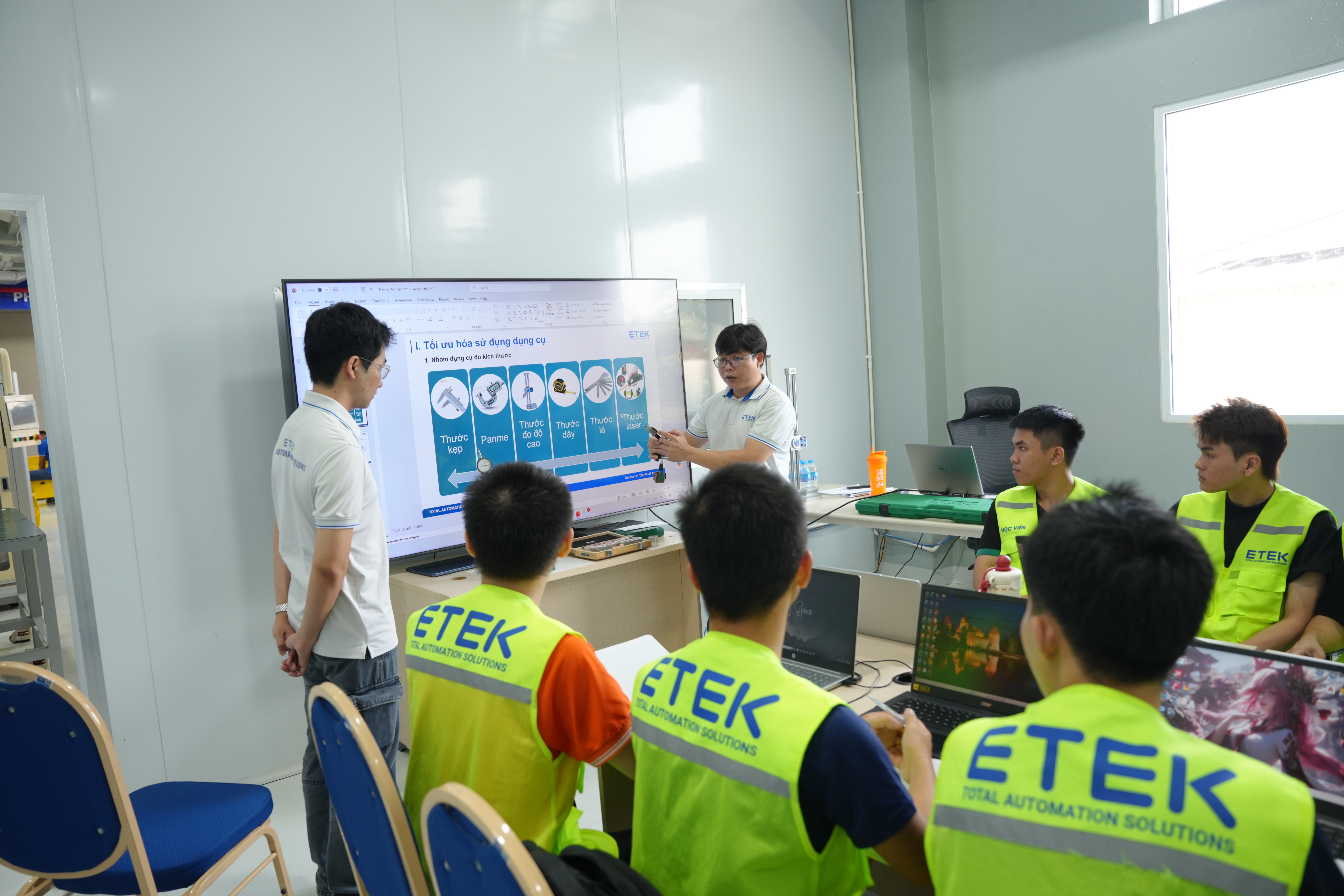 ETEK, industrial mechanics and pneumatics, hands-on machine assembly training, Loading-Unloading systems, mechatronics training, automation training, industrial pneumatic systems, mechanical assembly, mechatronics students, industrial automation education.